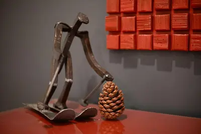 a metal statue of a person with a cone on a table at Private Woods - Cottage for 4 in South Lake Tahoe
