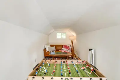 a lego floor in a room with a couch at Hot Tub and Game Room Luxe Cabin, Day Trip to Tahoe in Pollock Pines