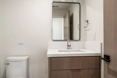 a bathroom with a sink and a mirror at New Luxury Free Standing 4BR 4 and a halfBA Home Obsidian Reserve #146 Priv Hot Tub, 2-Car Garage Great Views in Mammoth Lakes