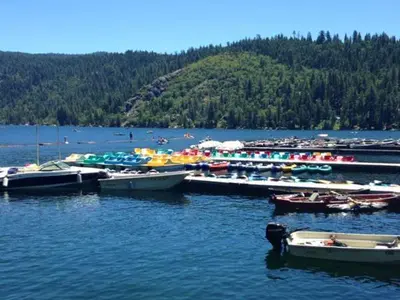 a bunch of boats in a body of water at Rustic and Scenic in Cold Springs