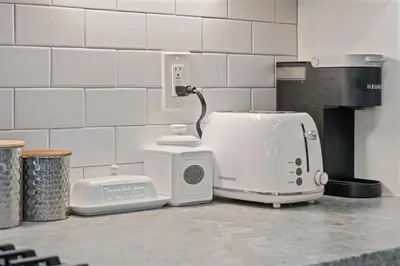 a white toaster sitting on a counter in a kitchen at CYH0883- Patricia's Mountain Paradise home in South Lake Tahoe