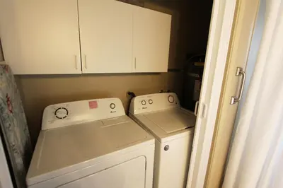 a small laundry room with a washer and dryer at HCH0864 - Donner Cabin home in South Lake Tahoe