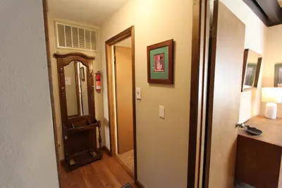a hallway with a door leading to a room at HCH0864 - Donner Cabin home in South Lake Tahoe