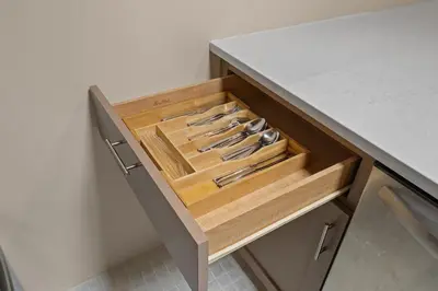 a wooden drawer with knives in it in a kitchen at Charming Tahoe Cabin in Incline Village