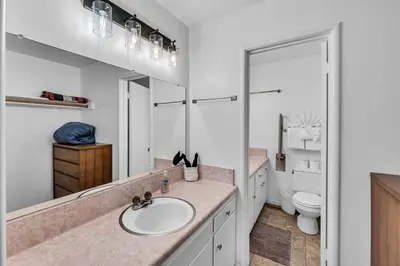 a bathroom with a sink and a toilet at Peaceful Forest Retreat Near Lake and Town in Tahoe City