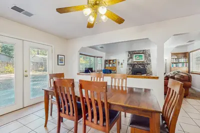 a dining room with a table and chairs at Golden Pine Lodge in South Lake Tahoe