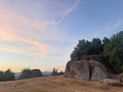 a rock sitting on top of a hill at NEW LISTING, Near Yosemite South Gate entrance and town, King bed, Hot Tub, BBQ, Firepit & Mountain Views in Oakhurst