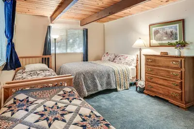 a bedroom with two beds and a dresser at 4 Mi to State Park Quiet Escape with Deck in Arnold in Arnold