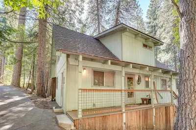a house in the woods with a fence at 4 Mi to State Park Quiet Escape with Deck in Arnold in Arnold