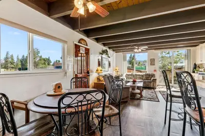 a dining room with a table and chairs at Tahoe Keys Studio Condo in South Lake Tahoe