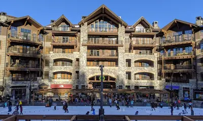 a large building with a skating rink in front of it at Indian Hills 6021 townhouse in Truckee