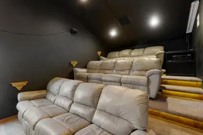 a room with a living room with a couch at Serene Road Lodge in Soda Springs