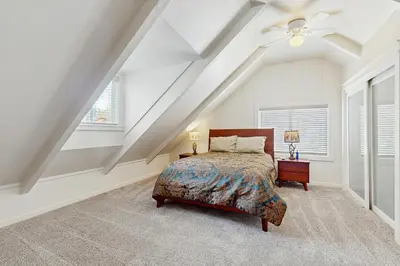 a bedroom with a bed and a ceiling fan at Meyers Tahoe Escape in South Lake Tahoe