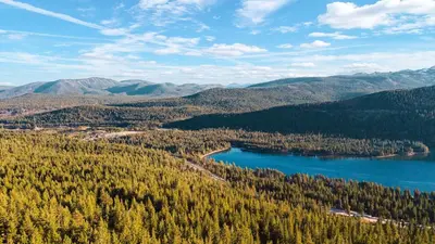an aerial view of a lake in the mountains at Hot Tub Sauna Forest Views in Tahoe Donner Cedar Summit by Avantstay in Truckee