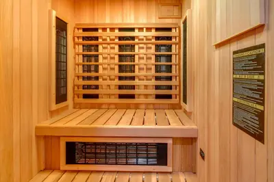a sauna with a window in a wooden cabin at Ski-InandSki-Out Retreat with Sauna in Bear Valley! in Bear Valley