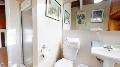 a bathroom with a toilet and a sink at Horizons 4 120 Great Complex Amenities, On The Shuttle Route, Walk To Shops and Restaurants condo in Mammoth Lakes