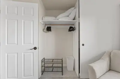 a room with a white door and a white couch at TKC0693- Keys Dream townhouse in South Lake Tahoe