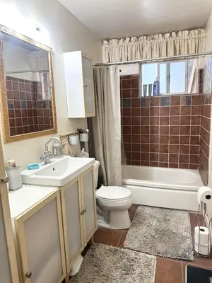 a bathroom with a sink and a toilet and a shower at CYH0822 - Pinter Pines Retreat home in South Lake Tahoe