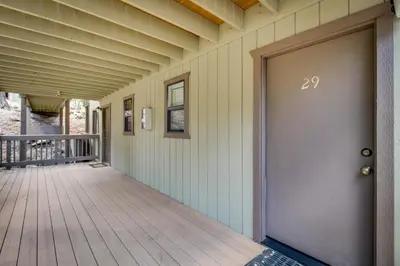a front door of a house with a deck at Hidden Valley 29 D in Mammoth Lakes