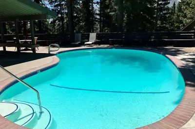 a large swimming pool with a blue pool at Hidden Valley 26 D in Mammoth Lakes