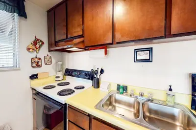 a kitchen with a sink and a stove at Hidden Valley 14 B in Mammoth Lakes