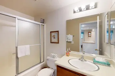 a bathroom with a sink and a toilet and a shower at Hidden Valley 30 D in Mammoth Lakes