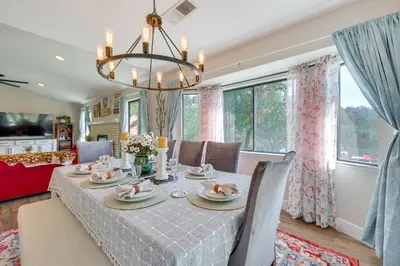 a dining room with a table and chairs at Scenic Yosemite Lakes Escape with Community Perks! in Coarsegold
