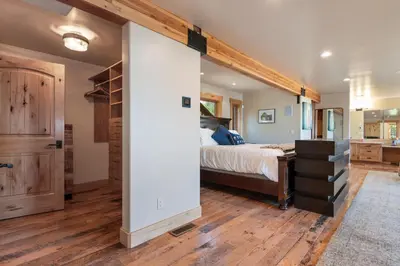 a large bedroom with a bed and a closet at Bella Casa - North Lake Tahoe in Tahoe City