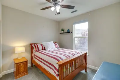 a bedroom with a bed and a ceiling fan at Family-Friendly Retreat with Playground in Reno! in Reno