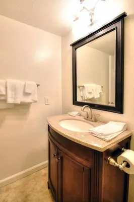 a bathroom with a sink and a mirror at (A207) Loft Condominiums in Yosemite West