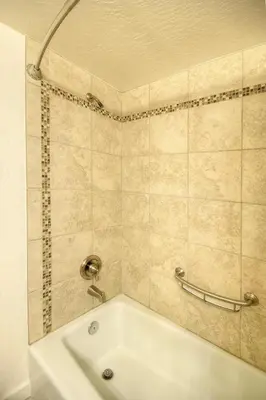 a bathroom with a bath tub and a sink at (A211) Loft Condominiums in Yosemite West