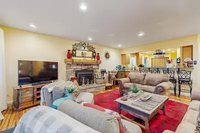 a living room with two couches and a fireplace at Colorado Pines Retreat in South Lake Tahoe