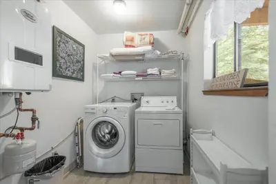 a small laundry room with a washer and dryer at Martis Landing home in Truckee