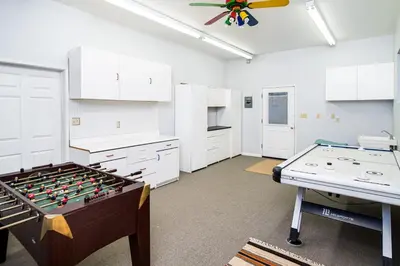 a room with a foosball table at Serenity Pines 1hr to Yosemite w BBQ and Game Room in Mariposa