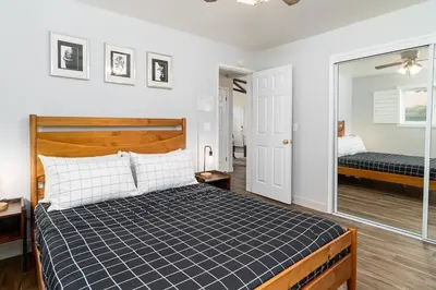 a bedroom with a bed in a room at Serenity Pines 1hr to Yosemite w BBQ and Game Room in Mariposa