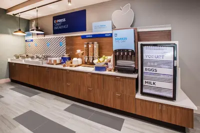 an apple store with a counter with an appleasteryasteryasteryasteryasteryasteryastery at Holiday Inn Express & Suites Sparks Reno East by IHG in Sparks