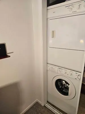 a washer and dryer in a corner of a room at Heavenly Stagecoach Ski Retreat in Stateline
