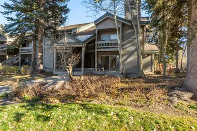 a house with trees in front of it at Snowcreek IV 559 in Mammoth Lakes