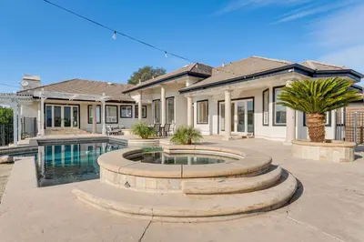a house with a swimming pool in a yard at Luxury Pilot Hill Estate on an 800-Acre Vineyard in Pilot Hill