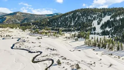 a river in the middle of a snow covered mountain at Studio Suite 2 Queen Beds Mountain View in Tahoe City