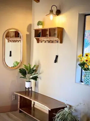 a room with a table and a mirror and plants at Yosemite Lodge 5BR Villa Hot Tub Game Room EV in Oakhurst