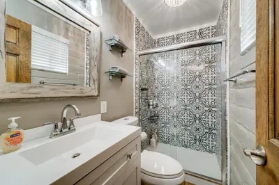 a bathroom with a toilet and a sink and a shower at All-Season Fun! Family Tahoe North Shore Getaway in Incline Village