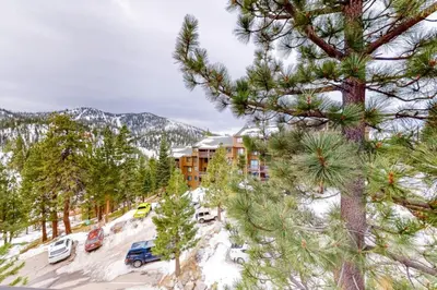 an aerial view of a resort with a parking lot and trees at WilderNest in Stateline