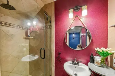 a bathroom with a sink and a mirror at 3390 Pine Hill Road home in South Lake Tahoe