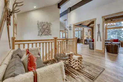 a living room with a couch and a table at Silverfox at Northstar in Truckee