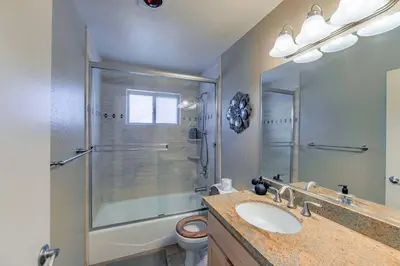 a bathroom with a shower and a sink and a toilet at Bakersfield Basecamp - Meyers Escape in South Lake Tahoe