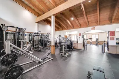 a gym with cardio equipment and treadmills at Walk to Gondola Truckee Retreat with Resort Perks! in Truckee