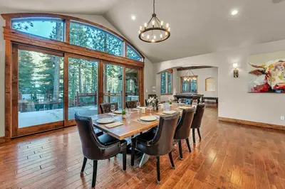 a large dining room with a table and chairs at South Lake Tahoe Escape - Private Hot Tub Pool in South Lake Tahoe