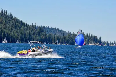a group of people on a boat in the water at Little Ski Lodge-Across from Spa & Sauna in Shaver Lake