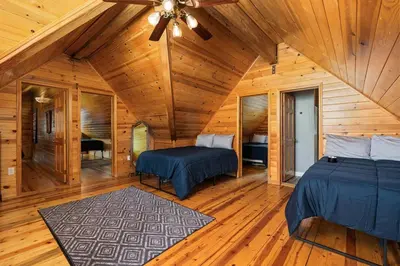 a bedroom with two beds and a ceiling fan at Black Diamond-Family Pet Friendly & Near China Peak in Big Creek